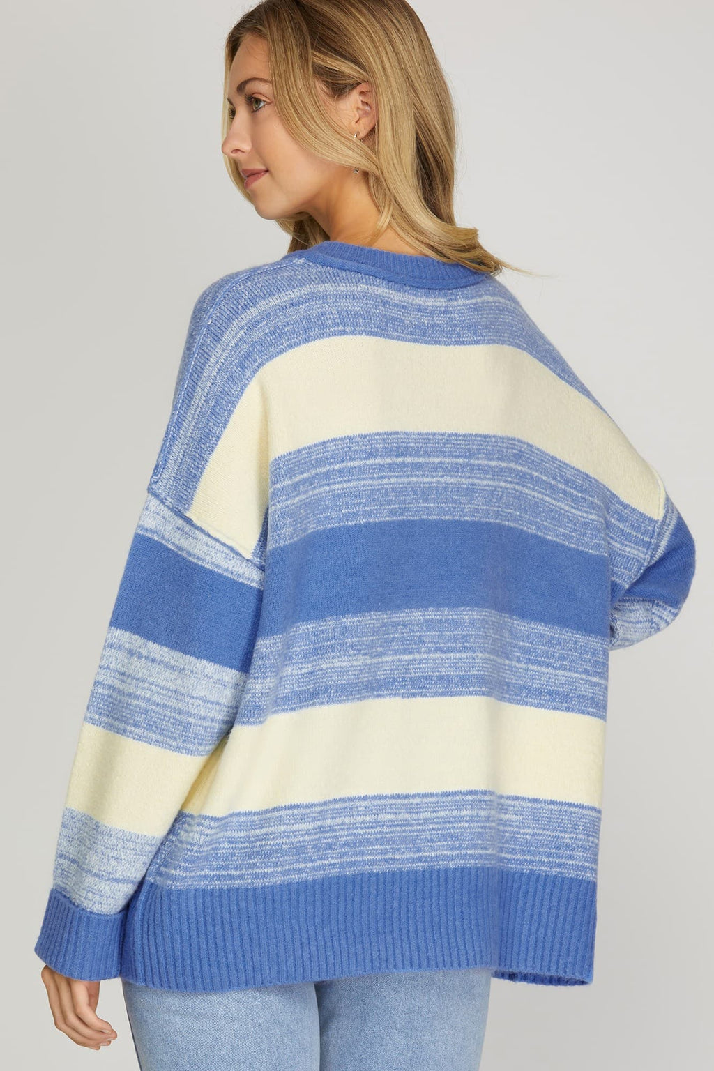 Blue striped sweater detail